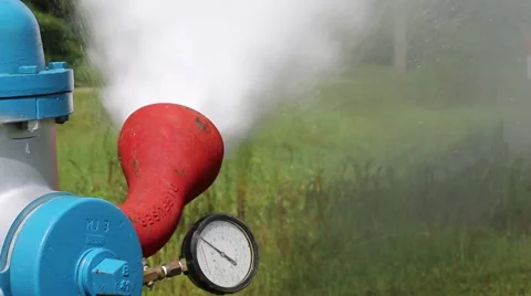 Close Up of Fire Hydrant Pressure Valve While Flushing Stock Footage 52889224