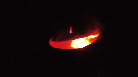 Close-up of a fire in an old metal barrel. Night. Stock Footage 266435724