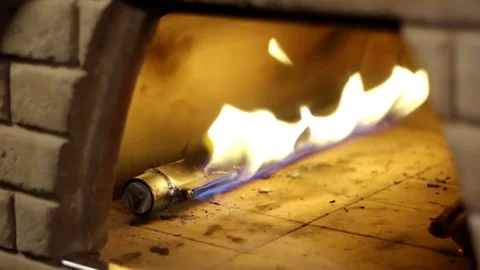 Close up of fire in a stone oven Stock Footage 83550925