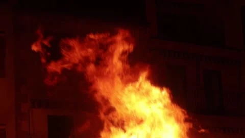 Close up of fire in street at night Stock Footage 316753937