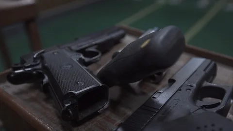 Close up of firearms during polygon practices in Brazil Stock Footage 89358130