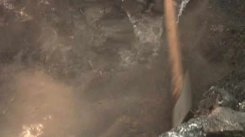 Close-up of Firefighter with pulaski digging out hot spot Stock Footage 40752126