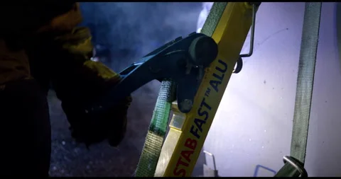 Close Up Of Fireman Tightening Lever Stock Footage 143538348