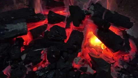 Close up of fireplace with burning charcoal for barbecue grill at picnic. Bright Stock Footage 201320175