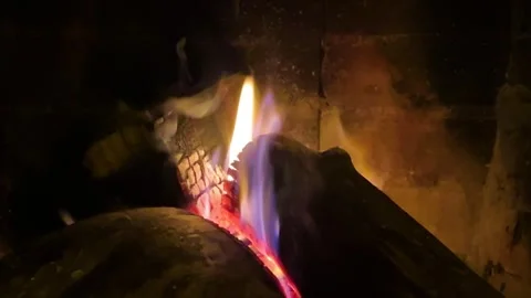 Close-Up Fireplace Fire with Burning Wood Stock Footage 322678708
