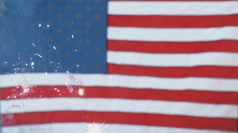 Close up of fireworks and flag on Fourth of July Stock Footage 101269686