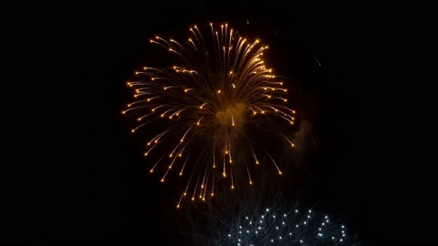 Close-up of fireworks. Multicolored rocket explosions in the night sky  Video stock 117791550