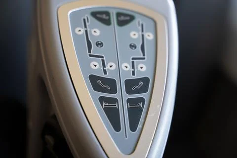 Close up on first class seat control panel Stock Photos
