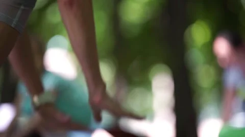 Close up fitness instructor doing exercise in park with group Stock-Footage 63434643