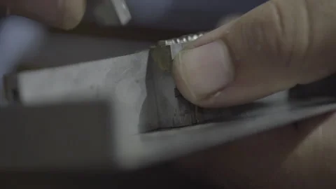 Close up of fitting  industrial letterpress characters Stock Footage 160521605