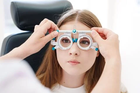 Close-up of fitting optometry trial frame for eye exam Foto stock