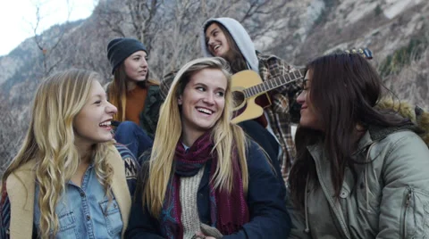 Close Up Of Five Lively Teens Bundled Up Outdoors In The Mountains Vídeos de archivo 34273481