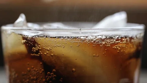 Close Up of Fizzing Soda Video stock 306384008