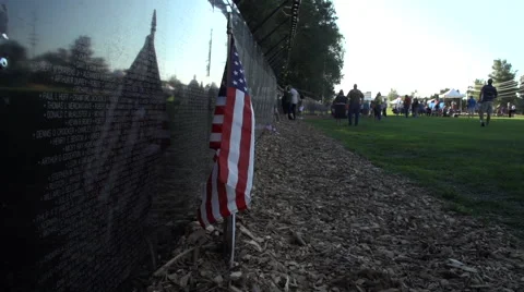 Close up of flag next to Vietnam Wall That Heals. Stock Footage 47389910