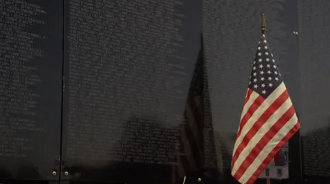 Close up of flag next to Vietnam Wall That Heals. Stock Footage 47393269