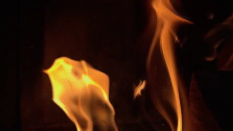 Close up of flame from bonfire moving in slow motion on black background. Stock Footage 305163078