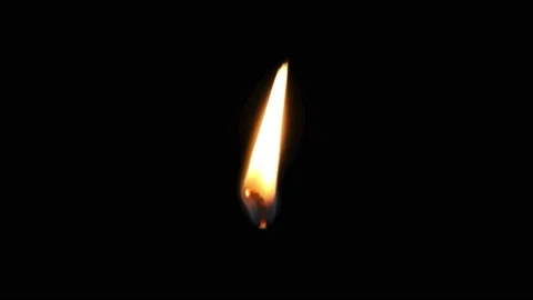 Close-up of the flame burning on the candle with isolated on a black background. Stock Footage 237677080