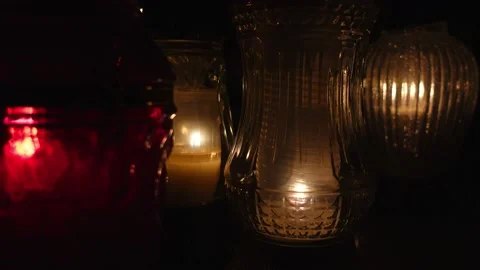 Close-up of the flame of the candle burning on the grave. Video stock 233970127
