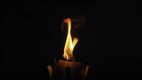 Close-up of the flame of coconut torch burning in the night Slow motion of Video stock 222452369