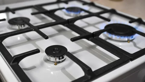 Close-up of flame during operation of the burner of the kitchen stove Stock Footage 223243238