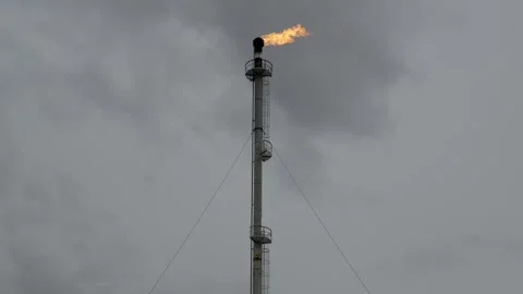 Close up to the flame of a natural gas refining plant, flare stack  Stock Footage 310337204