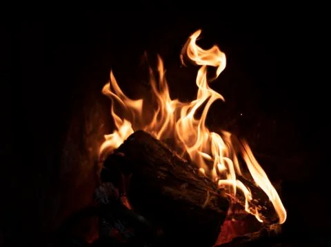 Close up on the flames of a burning fire Stock Photos