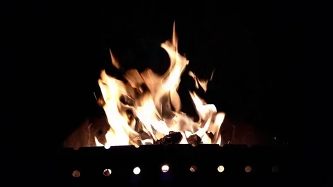 Close-up, flames from fire. Late evening. fire burns in barbecue Stock Footage 255805719