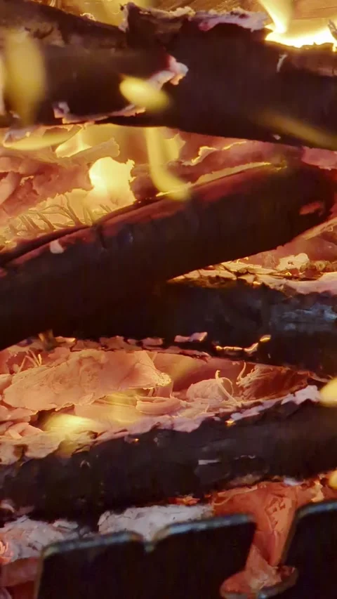Close-up, flames from fire. Night bonfire, logs are on fire, sparks fly. 4k, Stock Footage 341668413