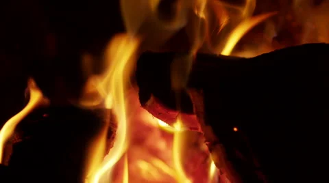 Close up flames at fireplace in the evening Видео 42254997