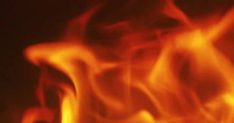 Close up flames in a fireplace in slow motion Video stock 64877969