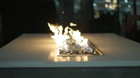 Close-Up Flames From Outdoor Firepit Table At Night Stock Footage 328160351