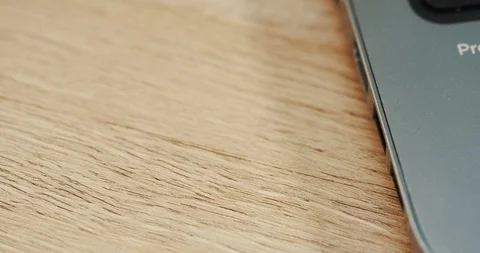Close up of the flash card being putted in the black laptop computer on the Stock Footage 86434845