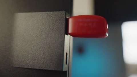 Close up on flash drive inserted and then unplugged from computer with data info Video stock 335241554