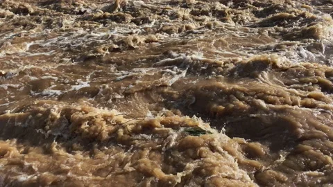 Close-up of a Flash flood after a storm in the mountains Stock-Footage 212771430