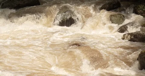 Close up flash flood flows after a heavy rainstorm. Stock Footage 281651373