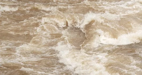 Close up flash flood flows after a heavy rainstorm. Stock Footage 284913854