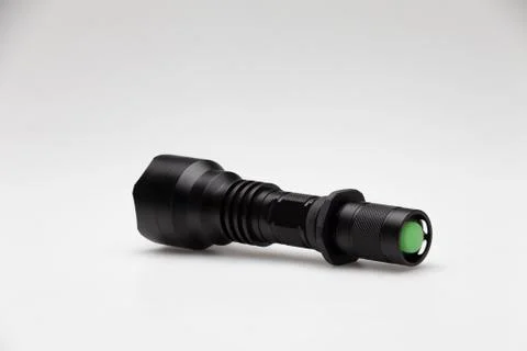 Close up of a flashlight isolated on white background Stock Photos