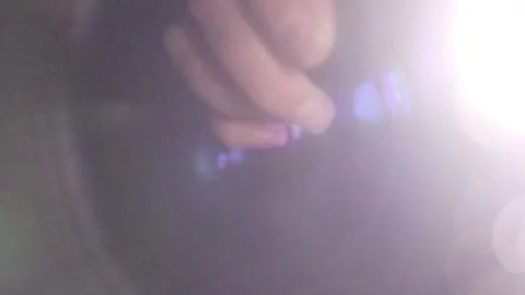 A close-up of a flashlight in movement Stock Footage 295463053