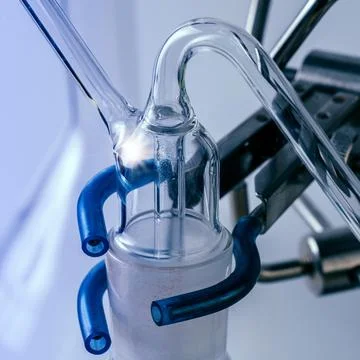 Close up flask on a tripod. Laboratory analysis equipment. Chemical laborator Stock Photos