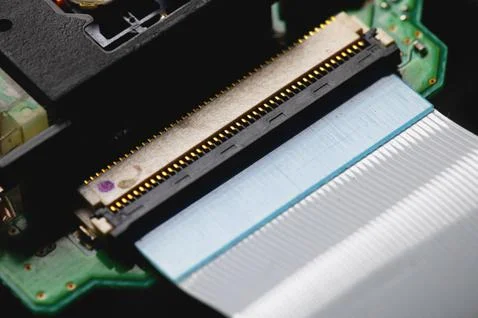 Close-up of flat cable and connector on green board Stock Photos