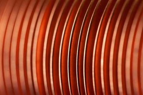 Close-up flat copper twisted plates at the factory Stock Photos