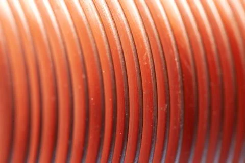 Close-up flat copper twisted plates at the factory Stock Photos
