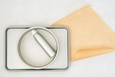 Close-up flat lay composition featuring parchment paper laid on a baking pa.. Stock Photos