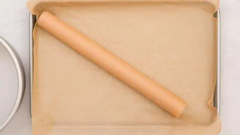 Close-up flat lay composition on a light grey background, showcasing parchm.. Stock Photos