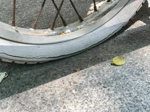Close up of flat tire of the Motorcycle Stock Photos