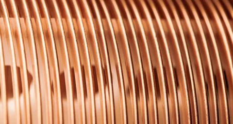 Close-up flat twisted copper wire at a factory Foto stock