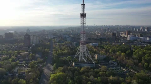 Close flight backlit to TV tower at sunrise Stock Footage 165078034