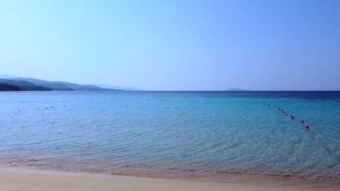 Close flight between two yellow pedal boats for renting on the beach Video stock 138961168