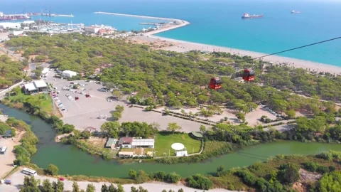Close-up flight next to the uphill funicular with the coast in the background 4K Stock-Footage 143915496