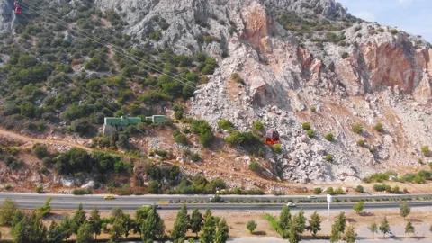 Close-up flight next to the uphill funicular with the coast in the background 4K Stock-Footage 143915784
